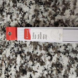 Singer folding ruler